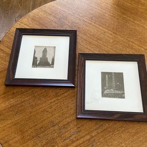 Framed and matted photos of New York Flatiron building and Radio City Music Hall